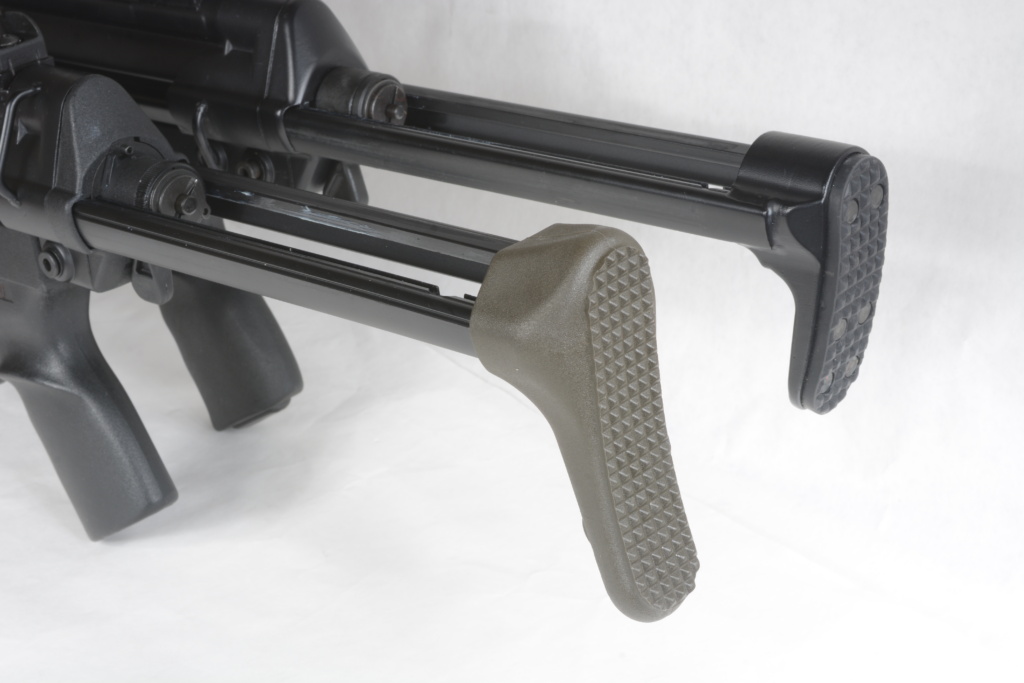 Green MKE stock for the AP53 (front) with the black G3 version shown on a PTR G3K clone. That green will never do on an otherwise-black gun.