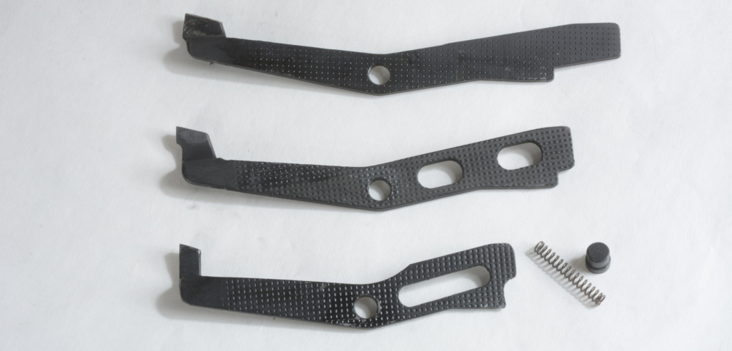 Trigger packs are transferrable across the roller lock family with an ejector change. Top to bottom are .308, .223 and 9mm ejectors. You’ll also need an ejector spring and pin, called an “axle.”
