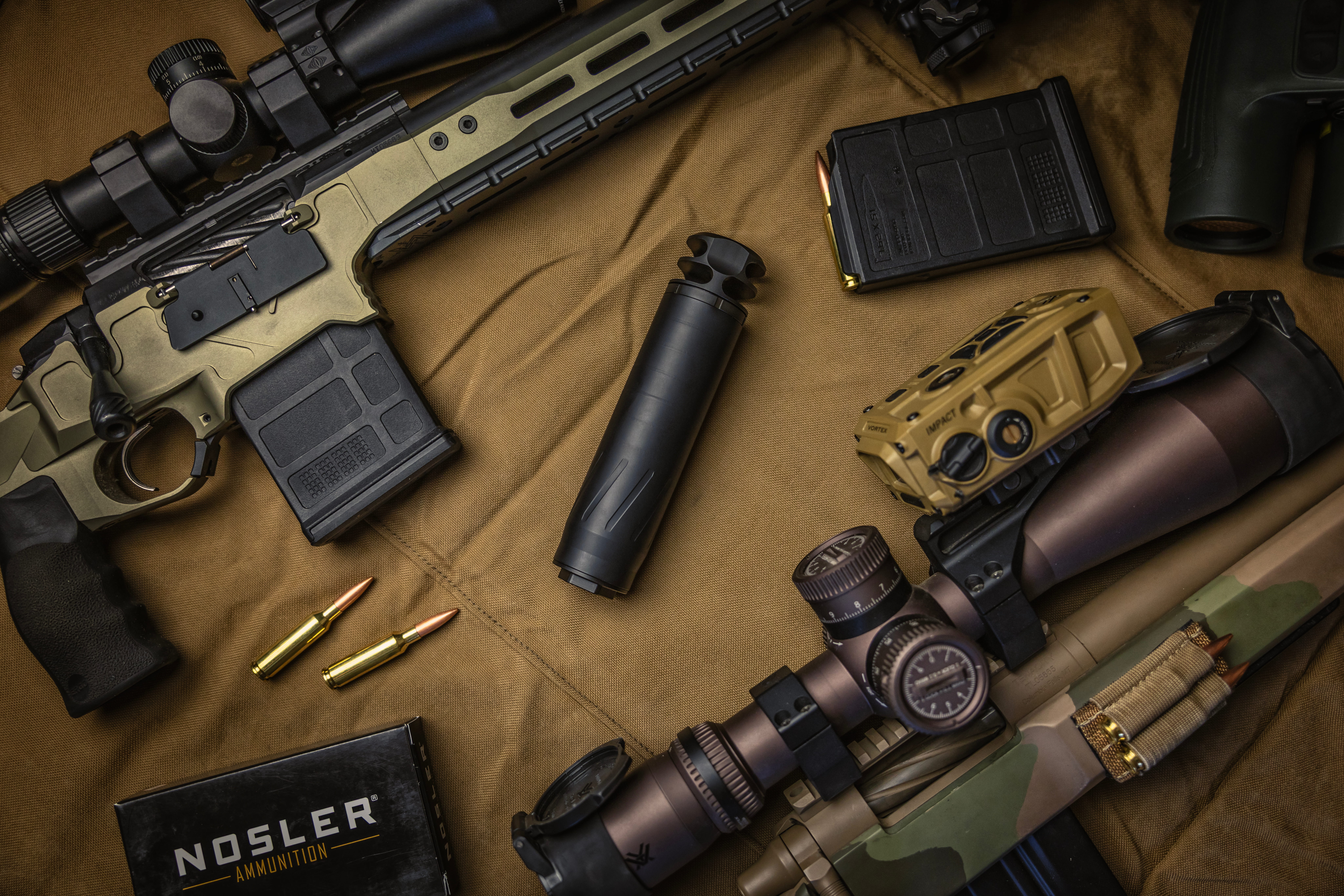 Banish Introduces Comp 6.5 Ss And Ti Suppressors